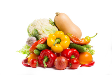decorative pattern of fresh vegetables on white background