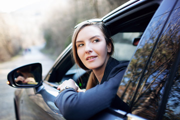 woman sitting in car