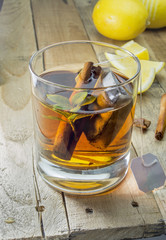 Cup of Healthy Tea over wood background