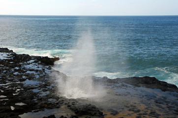 Fototapeta premium Water Shooting Upward From Spouting Horn Blowhole Kauai Hawaii