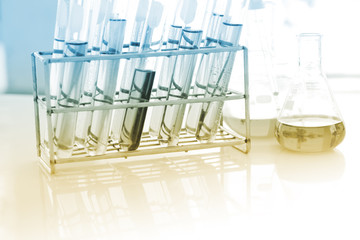 the lab or laboratory test tubes with colorful liquid