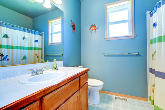 Simple bathroom interior in light blue
