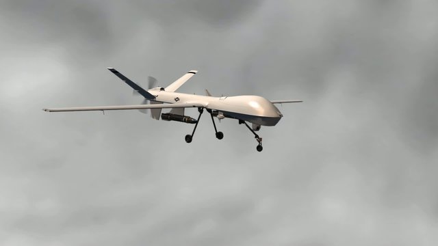 armed predator drone in flight
