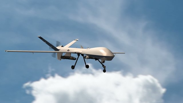 armed predator drone in flight