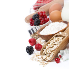 oatmeal, flour, eggs and berries - the ingredients for baking