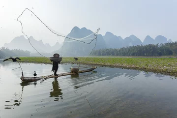 Muurstickers Cormorant, fish man and Li River scenery sight  © cchfoto