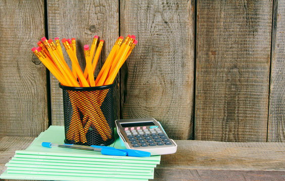 School accessories. On wooden background.