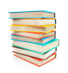 Multi-coloured books. On white background.