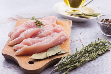 Fresh chicken on wooden table