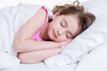 Adorable little girl sleeps.