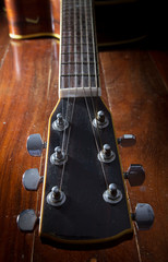 Dusty acoustic guitar,still life.
