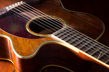 Obraz premium Dusty acoustic guitar,still life.