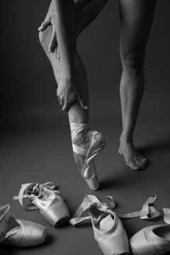 Slender ballerina legs on tip toe, monochrome