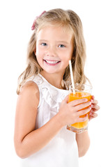 Smiling cute little girl with glass of juice isolated © svetamart