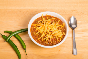 Cayenne Peppers by Bowl of Chili