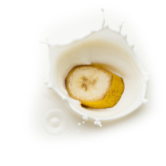 Banana slice in milk splash