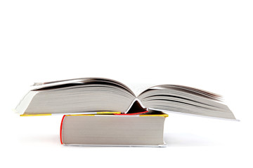 A stack of books on a white background.