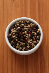 Mixed peppercorns in a bowl