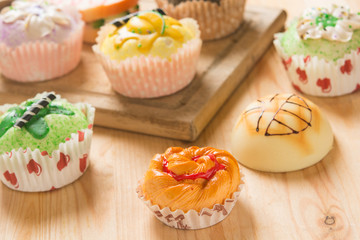 Obraz na płótnie Canvas cupcakes with food backgrounds