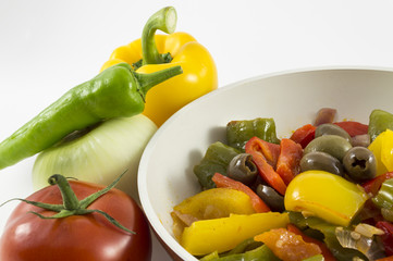 peppers, onions, tomatoes and olives