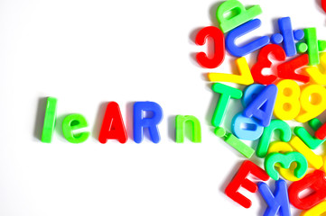 Naklejka premium Education word from magnetic letters