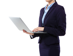 Businesswoman type on laptop computer