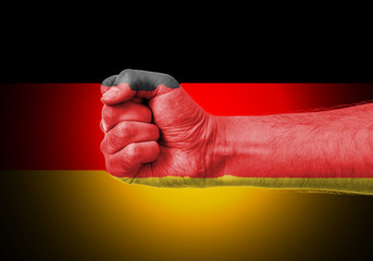Flag Of Germany Painted On A Man's Fist