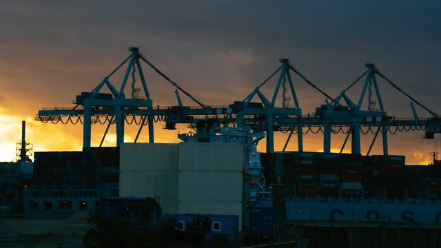 Crane in harbor, loading ships, Hamburg
