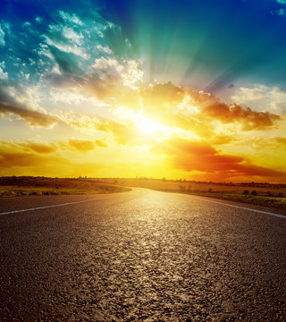 Good Orange Sunset Over Asphalt Road