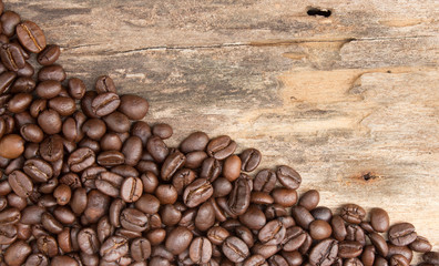 Background with coffee beans and wood texture