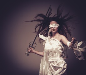 Femida, Goddess of Justice, with scales and sword
