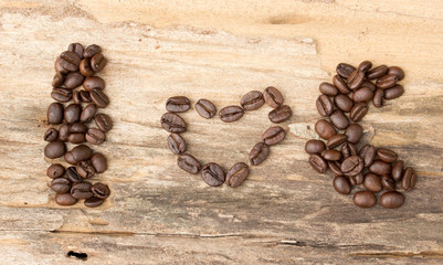 I love coffee made form coffee bean on wood background