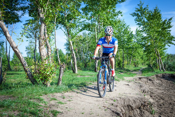 Fototapeta na wymiar Training on a mountain bike cross-country