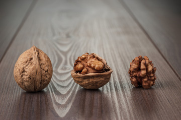 walnuts on the brown wooden table