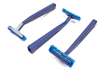 Blue razor blades isolated on white