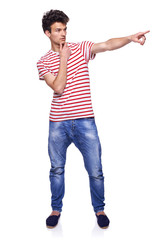 Young man pointing