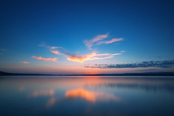 Fototapeta na wymiar Sunset Over the lake