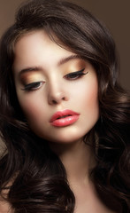 Pure Beauty. Portrait of Young Brunette with Glossy Makeup