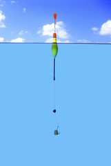 Fishing float and hook in water