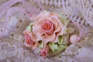 Fashion studio shot of a floral rose necklace (jewelery made of