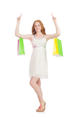 Naklejka premium Woman after shopping spree on white