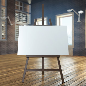 easel with empty canvas in interior