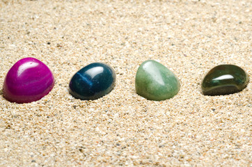 minerals and precious gems in the sand