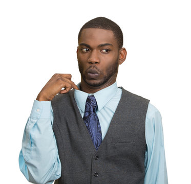 Man in awkward hot situation, blowing air, pulling shirt