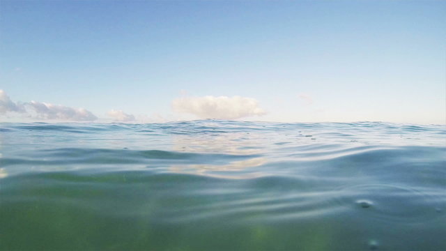 Ocean Surface, Half Under Half Over Slow Motion Video