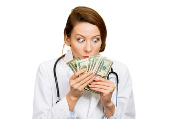 greedy, miserly health care professional, doctor looking at cash