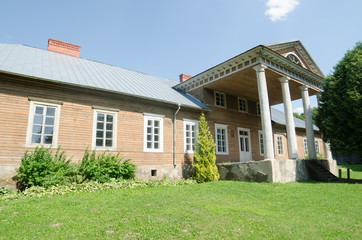 Fototapeta na wymiar Wooden manor in Veliuona, Lithuania