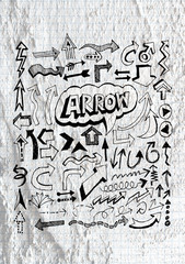 Arrow  and Hand drawn sketch arrows collection on wall texture b