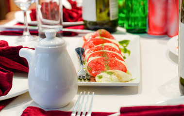 Plate of Italian mozzarella and tomato salad