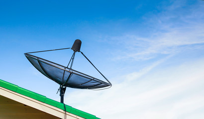 Satellite dish with sky on roof